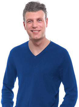 Man with blue pullover smiling